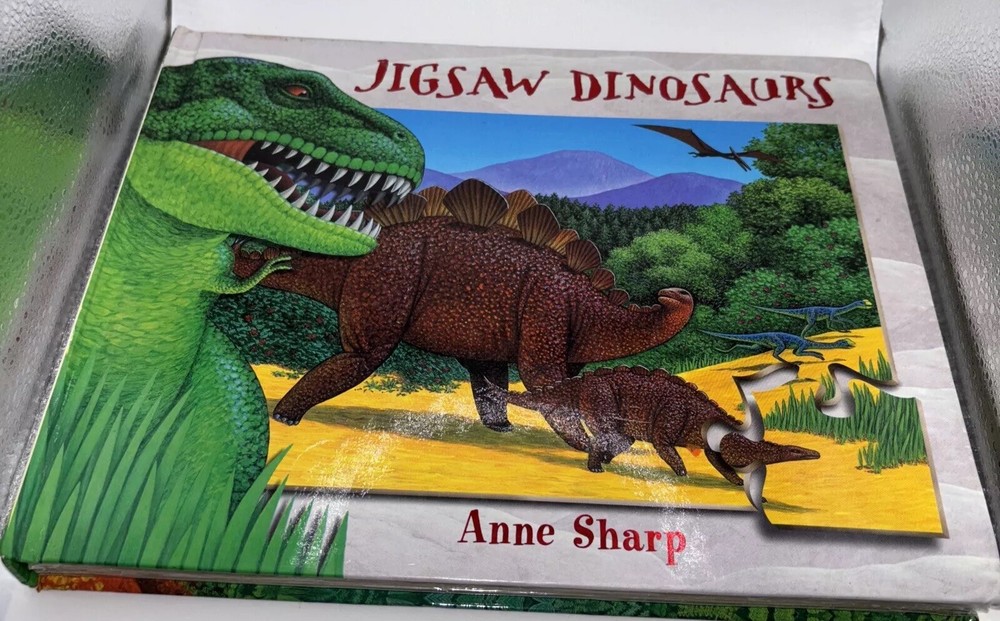 Jigsaw Dinosaurs by Anne Sharp. (2000, Hardcover) jigsaw puzzles in a book form