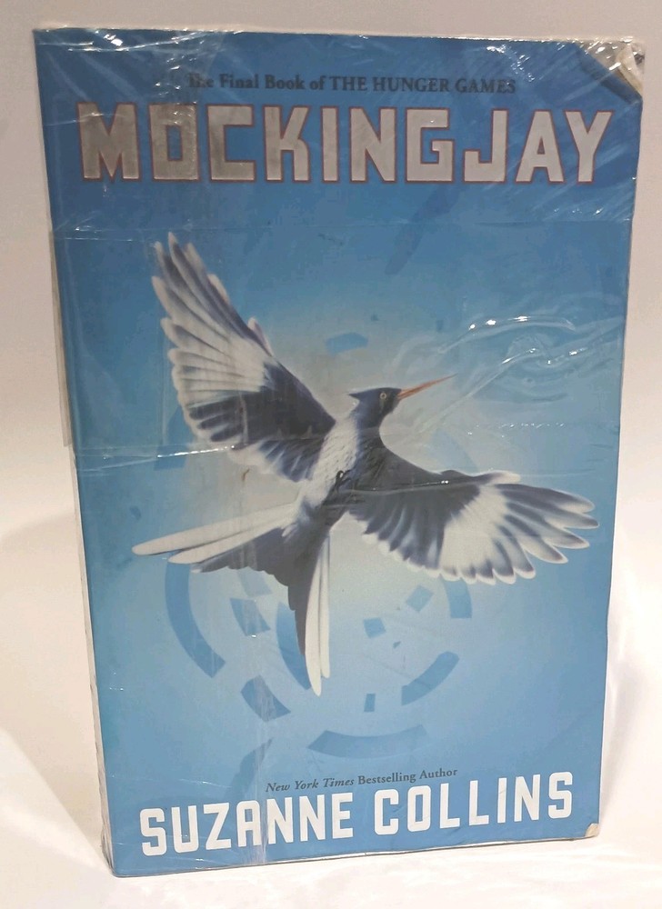 MOCKINGJAY , The Hunger Games, And Catching Fire by Suzanne Collins