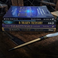 A Lot Of 4 J.R.R. Tolkien Soft Cover Books. See Photos For Titles.