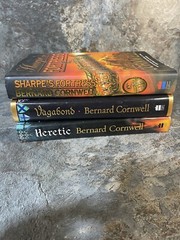 3 Bernard Cornwell Hardback Books – Heretic, Vagabond, Sharpe’s Fortress