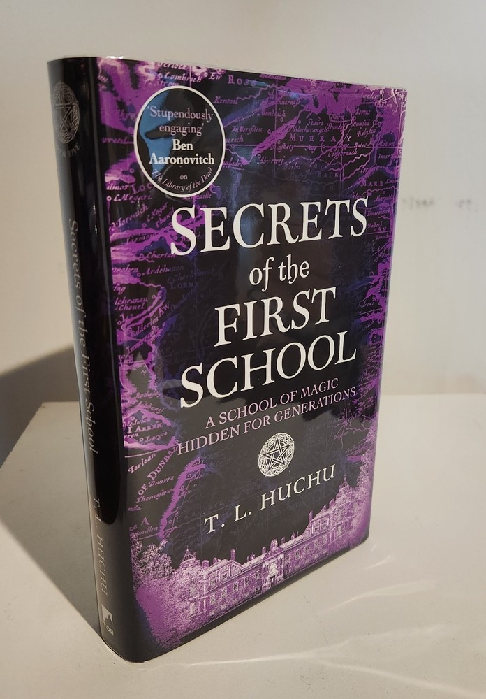 T.L.HUCHU SECRETS OF THE FIRST SCHOOL SIGNED NUMBERED 1st EDITION NEW UNREAD