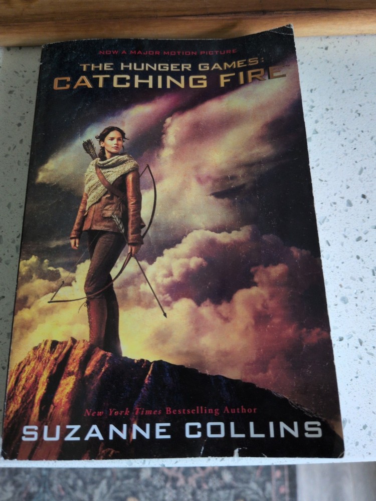 Catching Fire: Movie Tie-In Edition (Hunger Games, Book Two) by Suzanne Collins