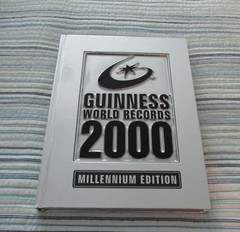 Vintage Guinness Book Of World Records 2000 Millennium Edition Silver Hard Cover