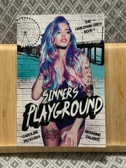 Sinners’ Playground – Paperback Caroline Peckham & Susan Valenti