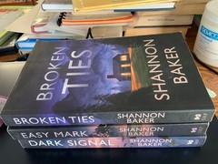 3 books: Dark Signal, Easy Mark and Broken Ties by Shannon Baker