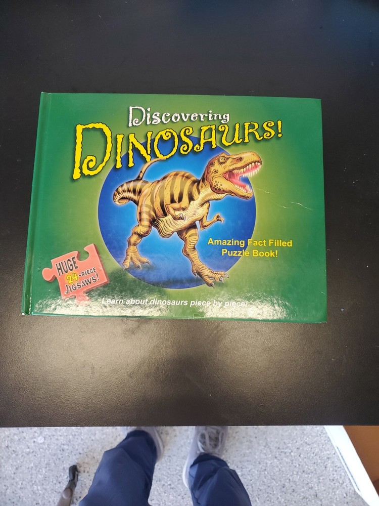Discovering dinosaurs Book and 5 jigsaw puzzles