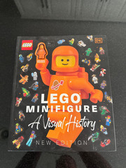 LEGO MINIFIGURE A Visual History – New Edition – With Exclusive Orange Spaceman!