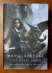 Max Gladstone. Four Roads Cross, first edition, 2016, 416 pages, new.