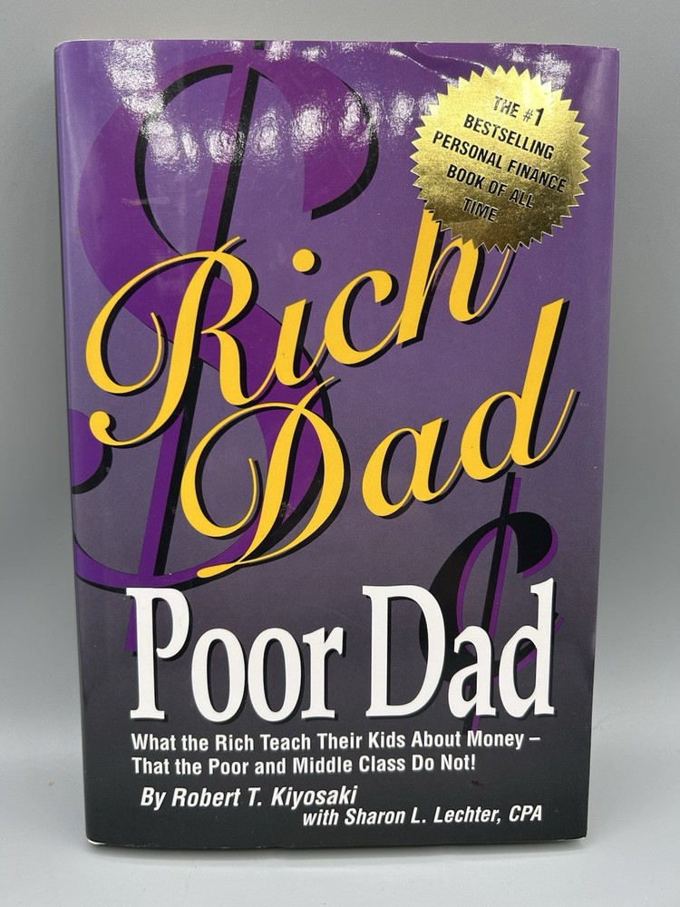 Rich Dad, Poor Dad By. Robert T. Kiyosaki Hardcover VERY GOOD – 1st Edition