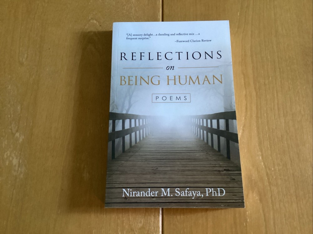 REFLECTIONS ON BEING HUMAN: POEMS By Nirander M. Safaya