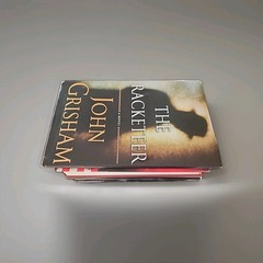 Lot of 3 Brad Taylor, Ken Follett and John Grisham hardcover books As Shown