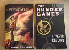 2 pb book lot: The Hunger Games (Bk1) & Catching Fire (Bk2). Suzanne Collins