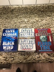 Clive Cussler Hardcover Books Lot of 27 See Photos for Titles Excellent Conditio